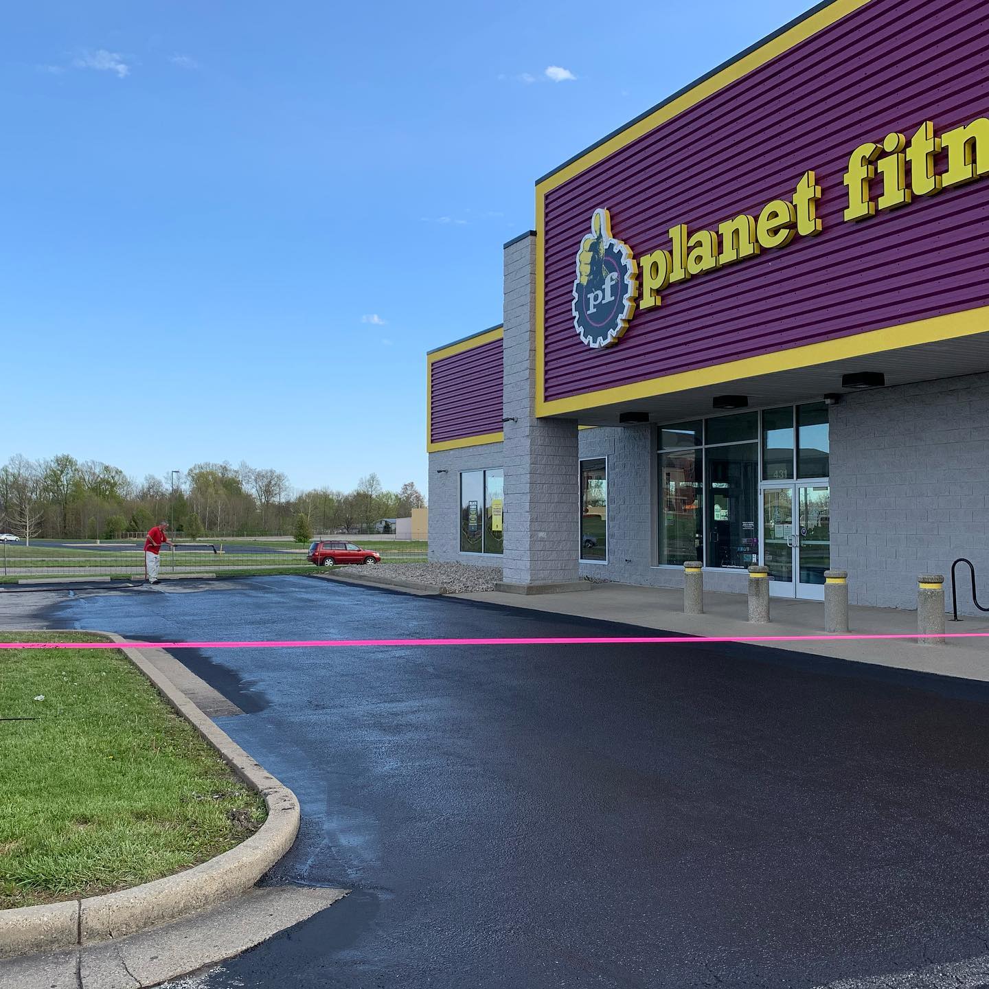 Coordinating Curb Appeal: How We Sealcoated Planet Fitness Without Missing a Beat